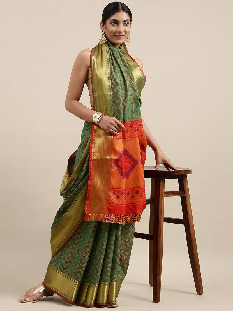 Green woven banarasi silk saree with blouse