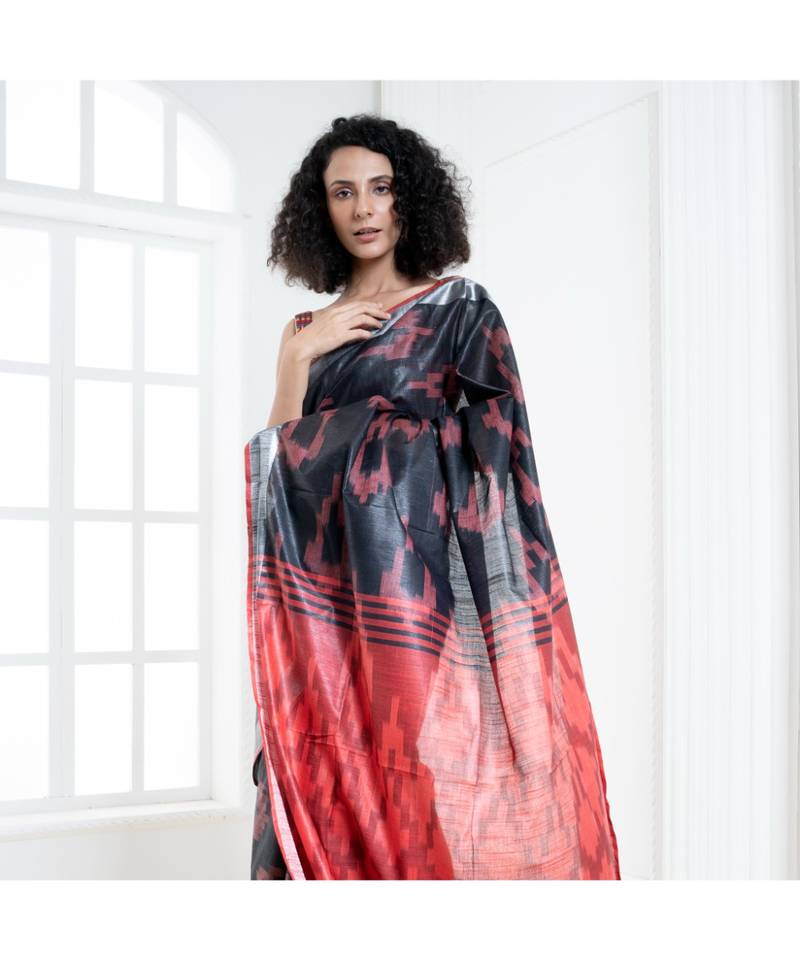 Black blended cotton ikkat saree with red motifs and pallu