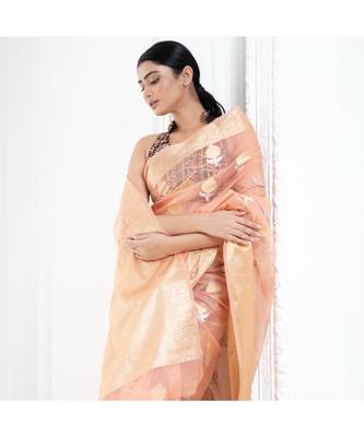 Peach organza silk saree with zari border and silver golden floral motifs 1