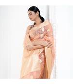 Peach organza silk saree with zari border and silver golden floral motifs