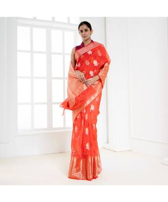 Fire orange organza silk saree with zari border and silver golden floral motifs 2
