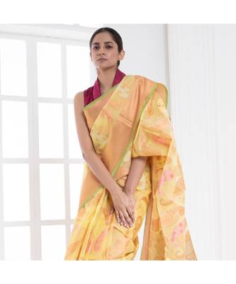 Yellow silk organza saree with woven ambi design 1