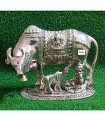 BRIJ HAAT White Metal Kamdhenu Cow and Calf with Gopal Showpiece for Home Decor and Decorative Gift Item Big 17cm Silver