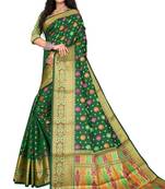 Green woven silk blend saree with blouse