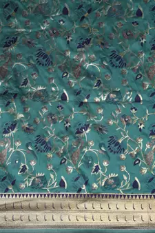 Teal woven banarasi silk saree with blouse