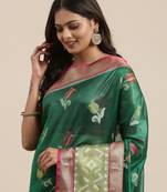 Green woven art silk saree with blouse
