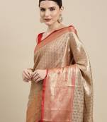 Beige woven kanchipuram silk saree with blouse