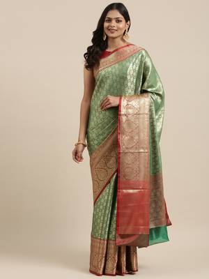 Green woven kanchipuram silk blend saree with blouse 2