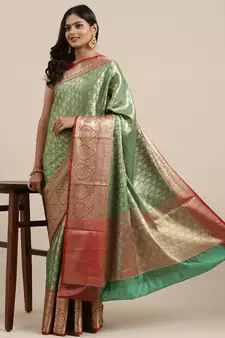 Green woven kanchipuram silk blend saree with blouse