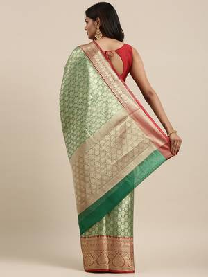Green woven kanchipuram silk blend saree with blouse 4
