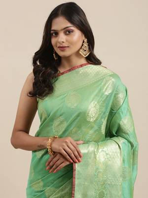 Sea green woven banarasi silk saree with blouse 1