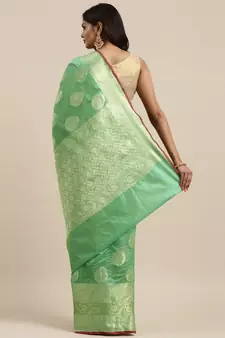 Sea green woven banarasi silk saree with blouse