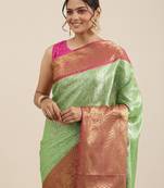 Green woven Faux kanchipuram silk saree with blouse