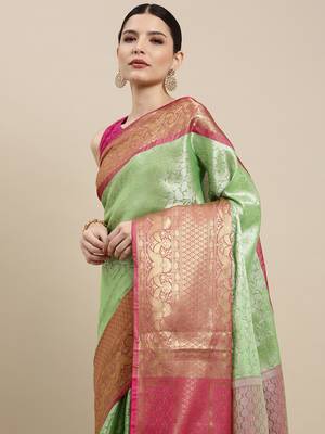 Green woven kanchipuram silk saree with blouse 1