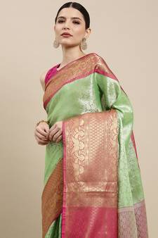 Green woven kanchipuram silk saree with blouse
