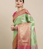 Green woven kanchipuram silk saree with blouse