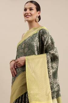 Green woven kanchipuram silk saree with blouse