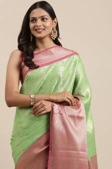 Green woven kanchipuram silk saree with blouse