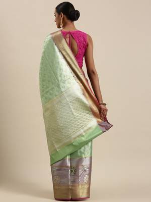 Sea green woven kanchipuram silk saree with blouse 4
