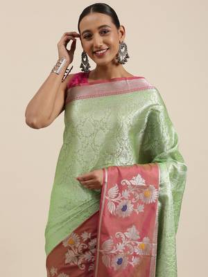 Green woven kanchipuram silk blend saree with blouse 1