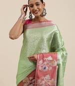 Green woven kanchipuram silk blend saree with blouse