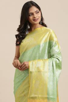 Green woven Faux kanchipuram silk saree with blouse
