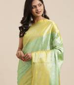 Green woven Faux kanchipuram silk saree with blouse