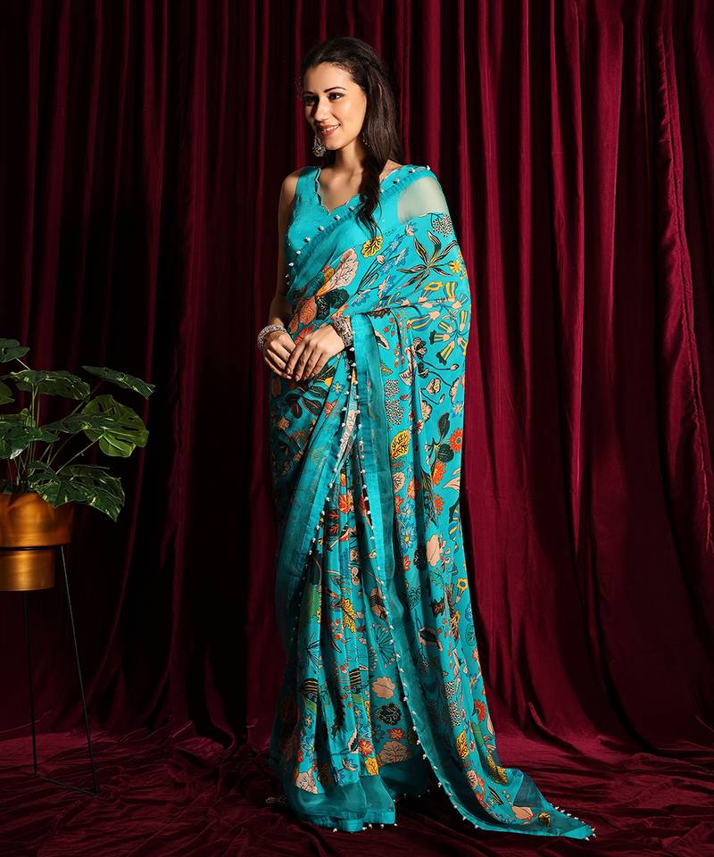 Turquoise Crepe Saree And Blouse