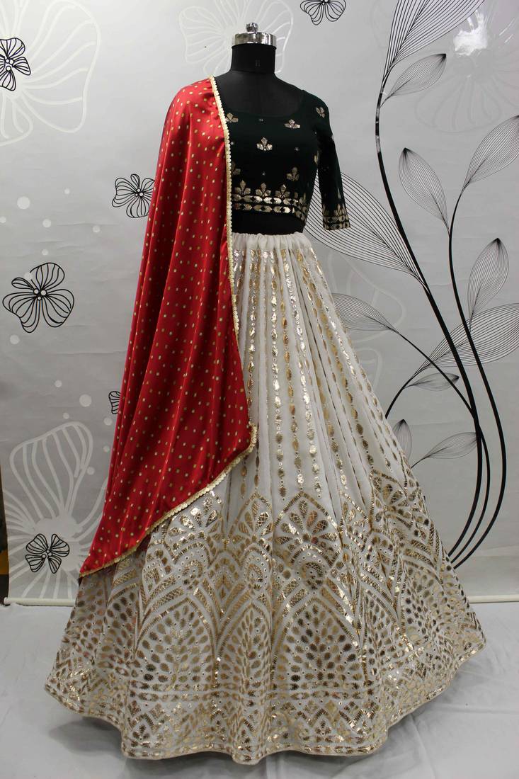 Shubhkala Off White Green And Red Colored Embroidered Georgette Semi Stitched Lehenga Choli And Dupatta