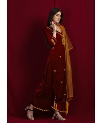 maroon velvet kurti with maroon pallazo  and mustard net dupatta emblished with tassels 2