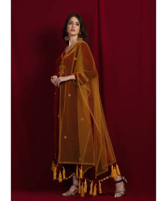 maroon velvet kurti with maroon pallazo  and mustard net dupatta emblished with tassels 3