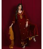 maroon velvet kurti with maroon pallazo  and mustard net dupatta emblished with tassels