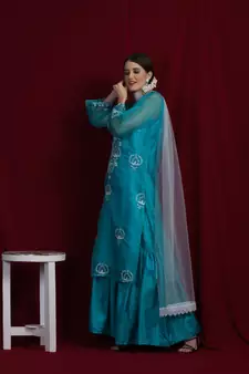 Organza green chikankari kurti with white and golden detailing