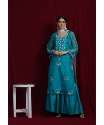 Organza green chikankari kurti with white and golden detailing 2