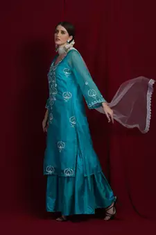 Organza green chikankari kurti with white and golden detailing