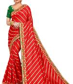 Red embroidered silk blend saree with blouse