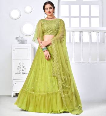 Fascinating Fluorescent Green Thread With Sequins Embroidered Net Party Wear Lehenga Choli 1