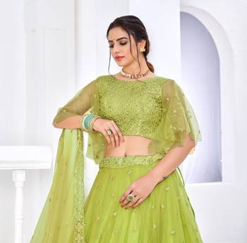 Fascinating Fluorescent Green Thread With Sequins Embroidered Net Party Wear Lehenga Choli 3