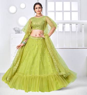 Fascinating Fluorescent Green Thread With Sequins Embroidered Net Party Wear Lehenga Choli 4
