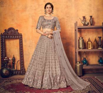 Prepossessing Dusty Rose Pink Thread With Sequins Embroidered Net Semi Stitched Party Lehenga 1