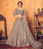 Prepossessing Dusty Rose Pink Thread With Sequins Embroidered Net Semi Stitched Party Lehenga
