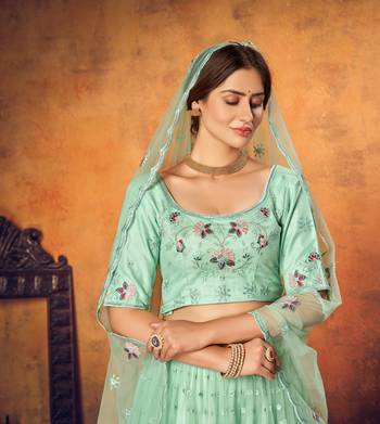 Good Looking Mint Green Thread With Sequins Embroidered Net Semi Stitched Wedding Lehenga 3