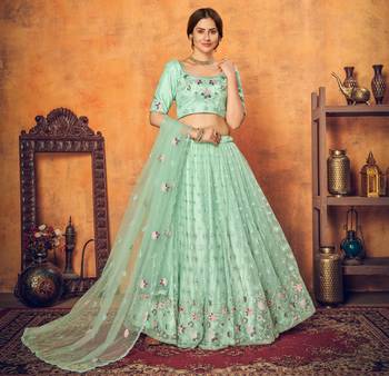 Good Looking Mint Green Thread With Sequins Embroidered Net Semi Stitched Wedding Lehenga 5