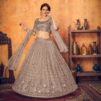 Prepossessing Dusty Rose Pink Thread With Sequins Embroidered Net Semi Stitched Party Lehenga 4