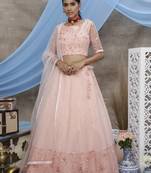 Peach Thread And Sequence Embroidered With All Over Pearl Rivet Stud Pasting Net Semi Stitched Bridal Lehenga