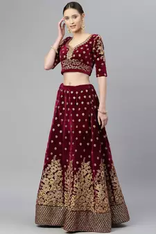 Engaging Purple Zari, Sequins And Thread Embroidered Velvet Semi Stitched Dulhan Lehenga