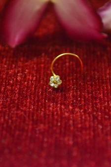 Gold Damond designer sizzling nosering or nose pin