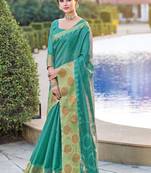 Green woven organza saree with blouse