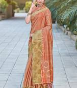 Peach woven organza saree with blouse