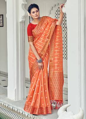 Orange woven organza saree with blouse 1